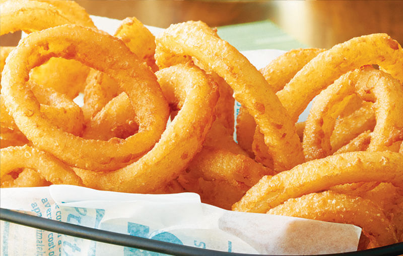 Intros Onion Rings in basket