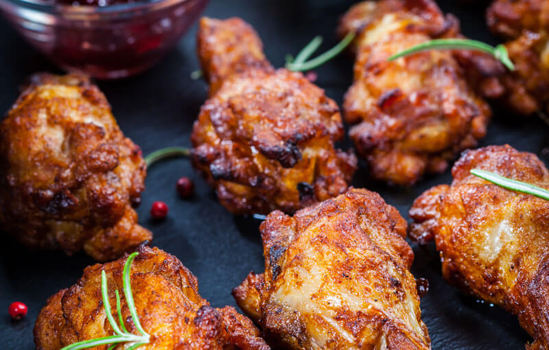 Bone-in chicken wings with garnish