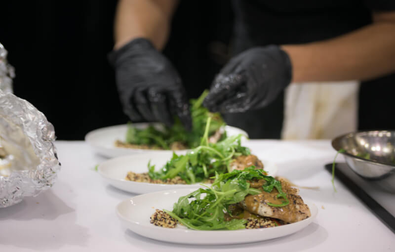 Shamrock Chef plating food at EXPO2019