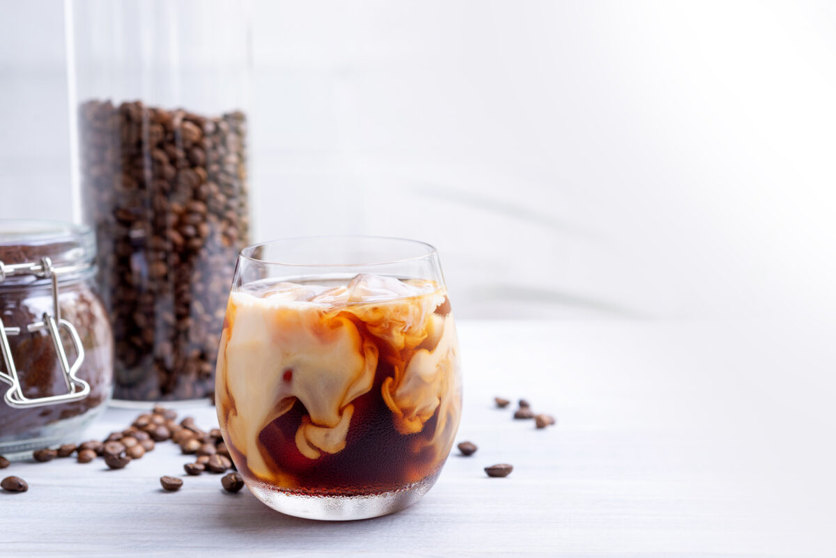 Cold Brew Coffee With Milk On White Wooden Table